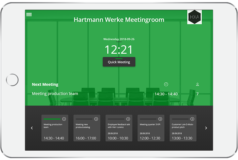 iPad displaying the HXA Room Booking App. It shows that the meeting room is unoccupied