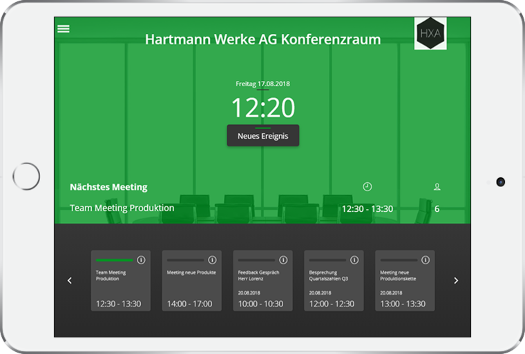 iPad displaying the HXA Room Booking System that the meeting room is unoccupied